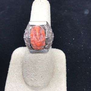 Sterling ring w/Ganesha hand carved in coral.